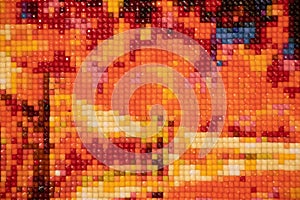 Multicolored mosaic background in red tones close up