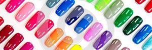 Multicolored nail Polish samples. Beauty banner. Trendy pattern. Nail varnish. Summer manicure. Cosmetic products.