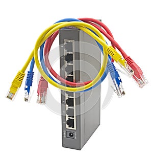 Multicolored network cables connected to router on a white