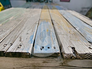 Multicolored old wooden table