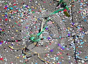 multicolored paper confetti on the floor after the party