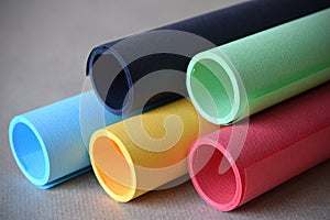 Multicolored paper tubes background graphic design resource photo