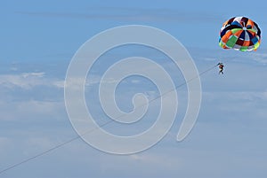 Multicolored Parasail in flight