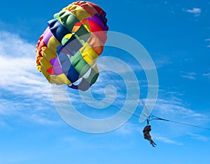 Multicolored Parasail in flight