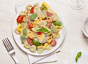 Multicolored pasta on light background