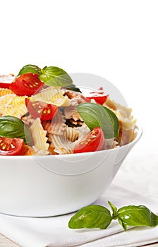 Multicolored pasta on light background
