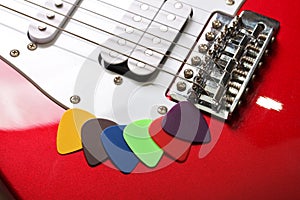 Multicolored picks on a electric guitar
