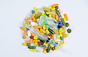 Multicolored pills and medicines capsules omega 3 selective focus