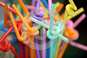 Multicolored plastic straws. Colorful drinking straws