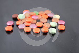 Multicolored round tablets