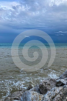 Multicolored sea after thunderstorm in Torremolinos