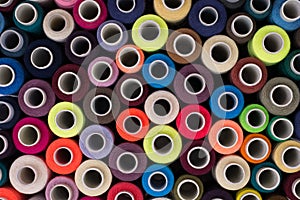 Multicolored sewing threads background