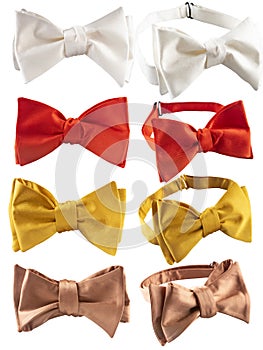 Multicolored silk bow ties on white isolate.