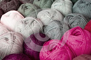 Multicolored skeins yarn, wool threads for knitting needles and crochet, for materials on textile arts, hobbies and leisure,