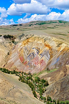 Multicolored soil of mercury occurrence in Altai steppe
