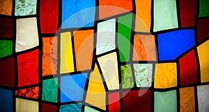 Multicolored stained glass with an irregular pattern.