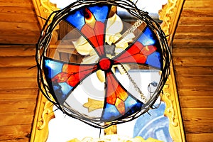 Multicolored stained glass window in the sun