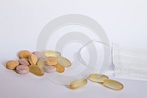 Multicolored tablets on a white background