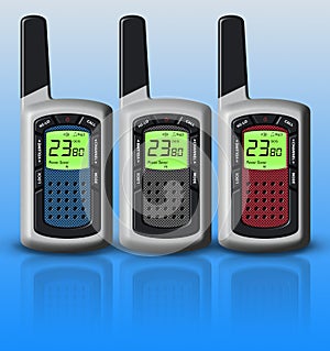 Multicolored walkie-talkies isolated on blue background