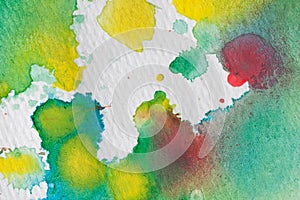Multicolored watercolor splashes as background. Abstract watercolor texture and background for designers.
