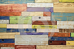 Multicolored wooden boards, painted planks of wall. texture. For modern colorful background on various topics