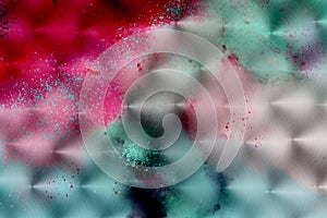 Multicoloured abstract pattern on the hand brushed circular metal background