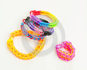 Multicoloured elastic loom band bracelets