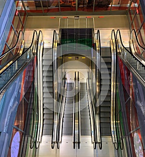 Multicoloured escalator. Escalator market hall in Rotterdam.