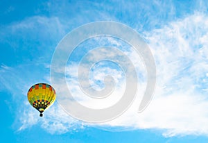 Multicoloured Hot air ballon and clouds