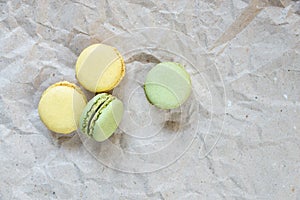 Multicoloured macaroons on craft paper