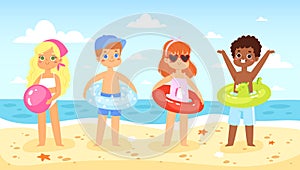 Multicultural children have fun and jumping on the beach. Boys and girls with inflatable rubber circles run near the sea. Happy ki