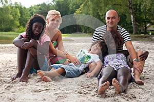 Multicultural family on the beach