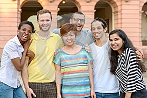 Multicultural group of people posing for portrait