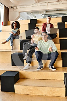 A multicultural group of students sitting