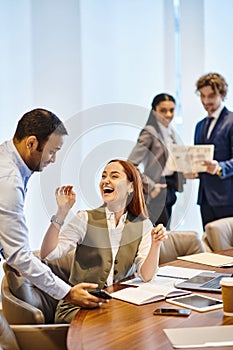 Multicultural professionals collaborate at a conference