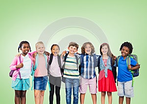 Multicultural School kids in front of green background