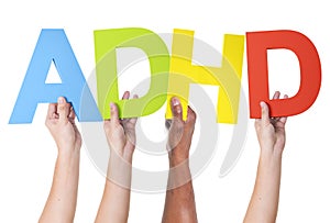 Multiethnic Arms Raised Holding ADHD photo