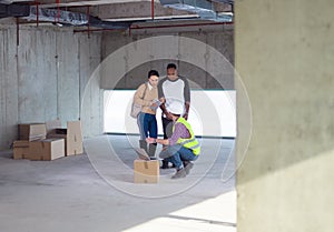 Multiethnic business people in group, architect and engineer on construction site