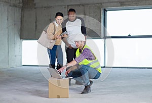 Multiethnic business people in group, architect and engineer on construction site