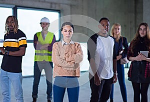 Multiethnic business people in group, architect and engineer on construction site