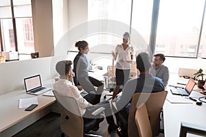 Multiethnic business team people communicating at corporate group briefing