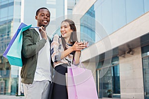 Multiethnic couple shopping together