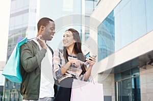 Multiethnic couple shopping together