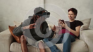 Multiethnic couple using new trends technology