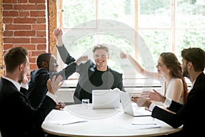 Multiethnic coworkers ready to give each other fist bump.