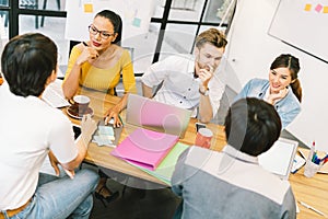 Multiethnic diverse group of people at work. Creative team, casual business coworker, or college students in project meeting