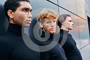 multiethnic elegant men in turtlenecks posing