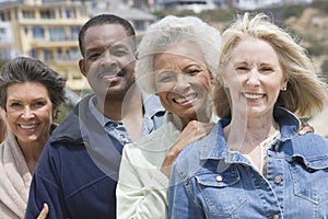 Multiethnic Friends Standing In A Row photo