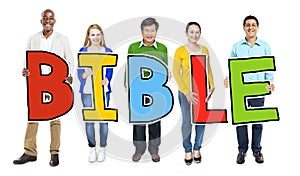 Multiethnic Group of People Holding Letter Bible Concept