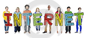 Multiethnic Group of People Holding Letter with Internet Concept